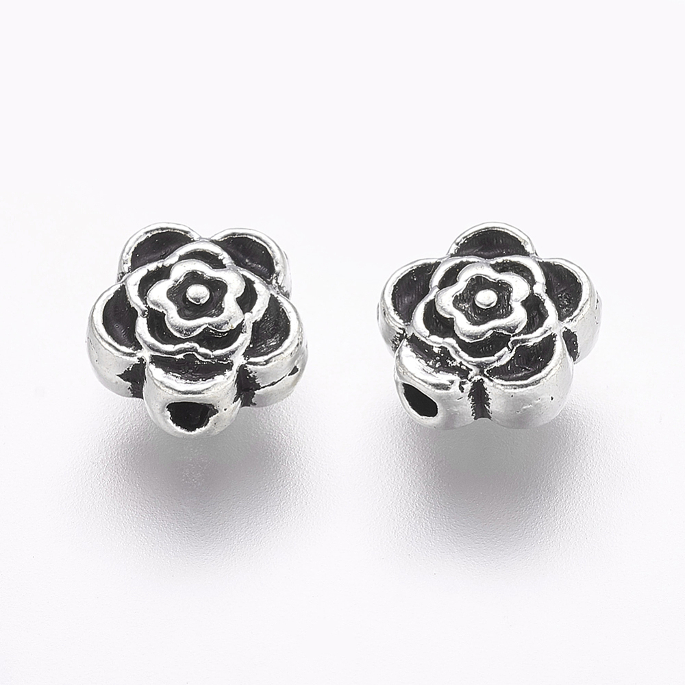 Flori argintiu antichizat,  7x4mm 1 buc