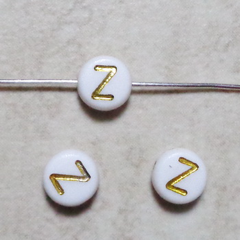 Margele plastic alb cu auriu 7x4mm, litera Z 1 buc
