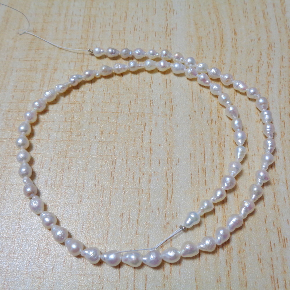 Perle de cultura alb-sidefat, 5~6x4~5mm-sir 70 buc(39cm) 1 buc