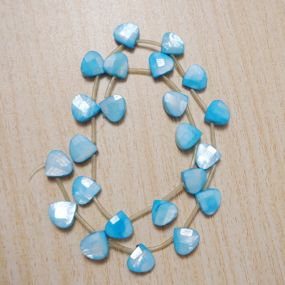 Sidef bleu, briolete fatetate 10x10x5mm-sir 22 buc 1 buc