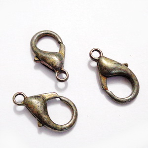 Inchizatoare ovala, bronz, 21x11mm-vopsea decojita