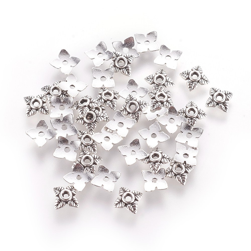 Capacel argintiu antichizat cu 4 frunzulite, 6x2mm 1 buc